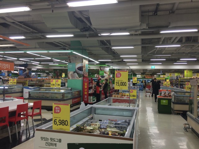 the brightly lit aisles of Homeplus